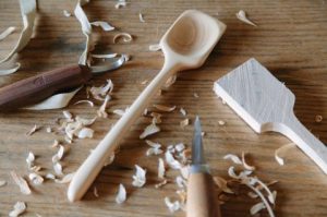 wood being carved into spoons