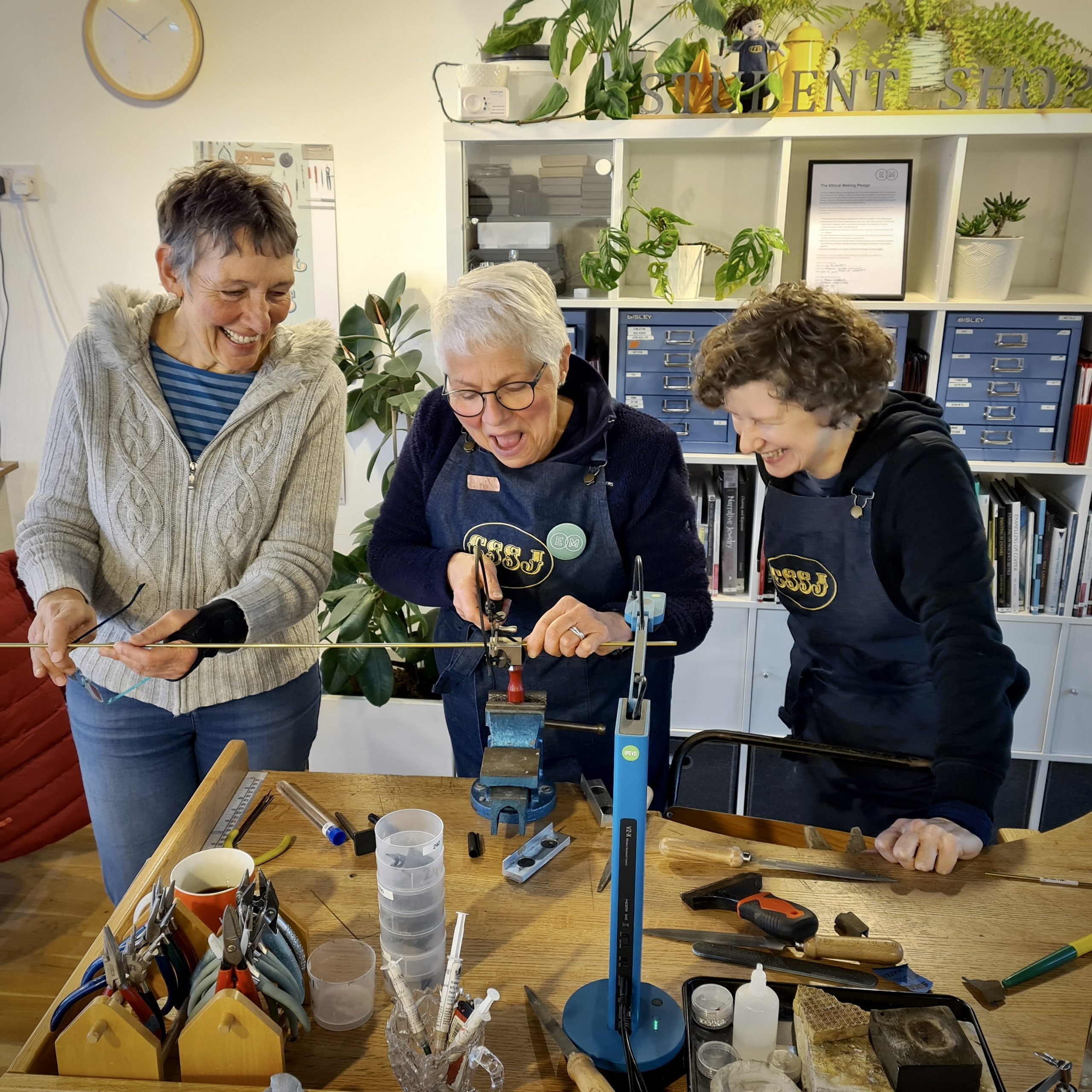 Happy students making jewellery in Dunblane